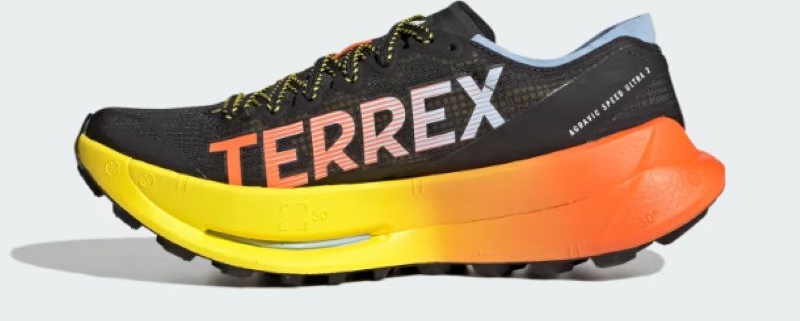 Adidas Terrex Agravic Speed Ultra 2 vue de profil, avec une empeigne noire et une semelle jaune et orange.